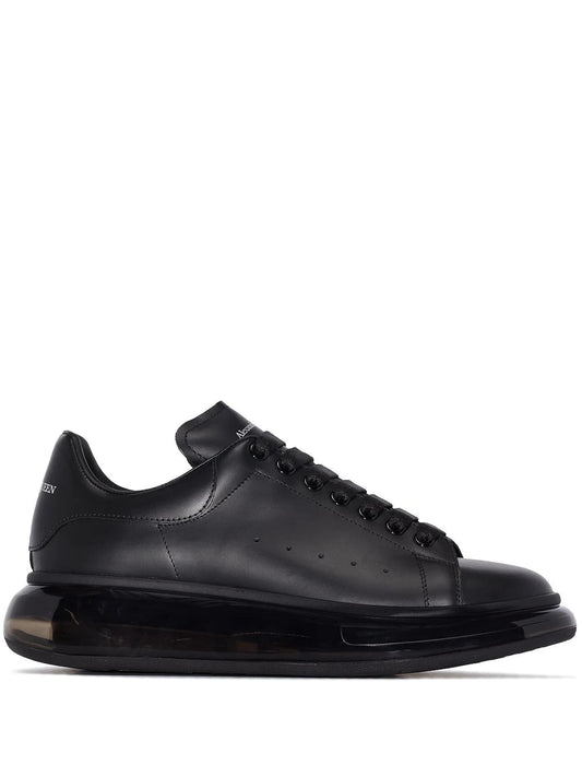 Tenis Alexander McQueen mid-top con suela transparente