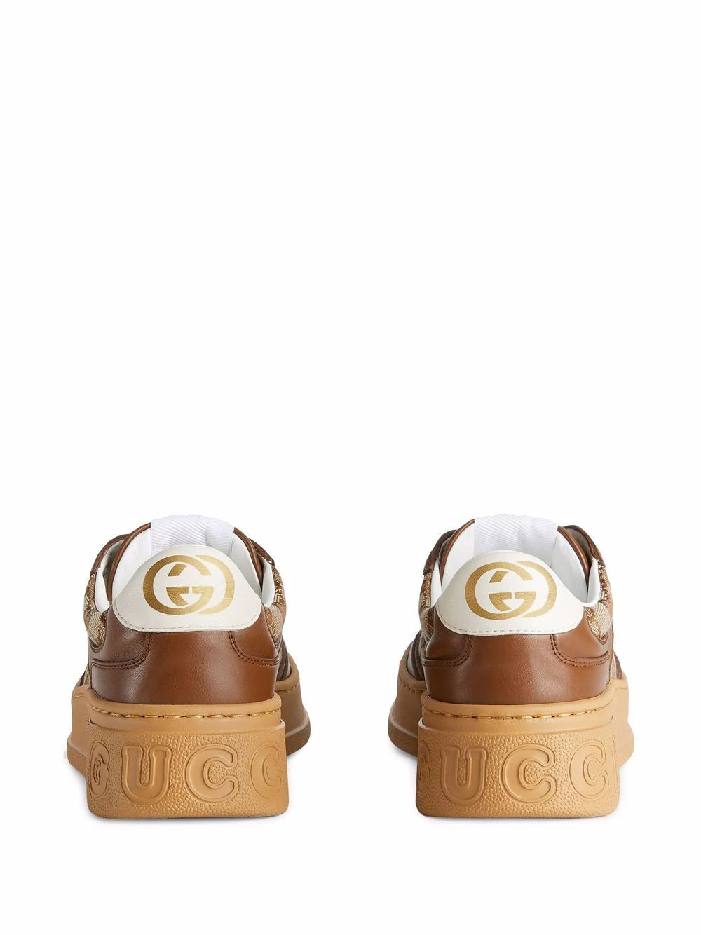 Gucci tenis bajos con relieve GG Mujer