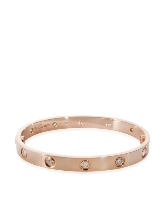 Cartier pulsera Love en oro rosa de 18kt con diamantes