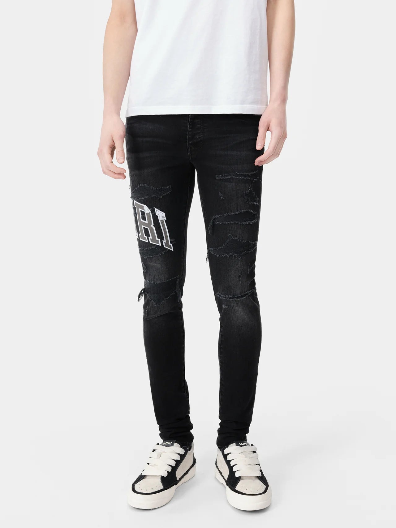 AMIRI VARSITY LOGO REPAIR JEAN